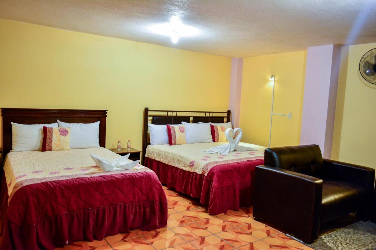 Hotel Edelmira โกมิตัน เด โดมิงเกซ ภายนอก รูปภาพ